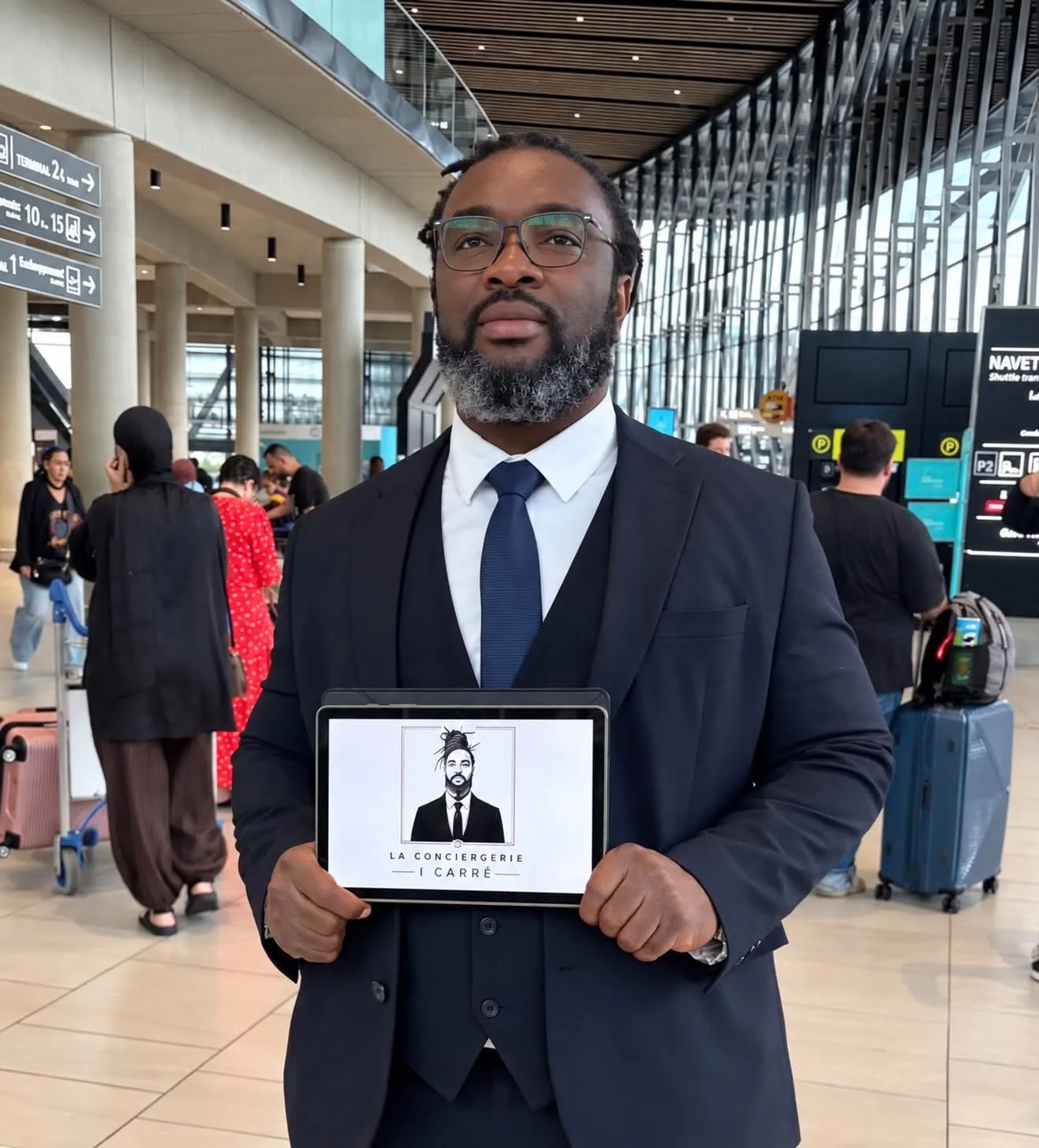 At Lyon Saint-Exupéry airport, the client’s name clearly displayed.